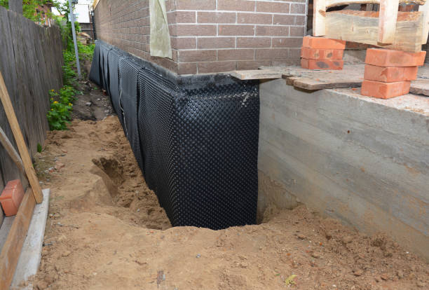 SJ Waterproofing Pros technician performing targeted Vapor Barrier Installation assessment in Sparta, KY